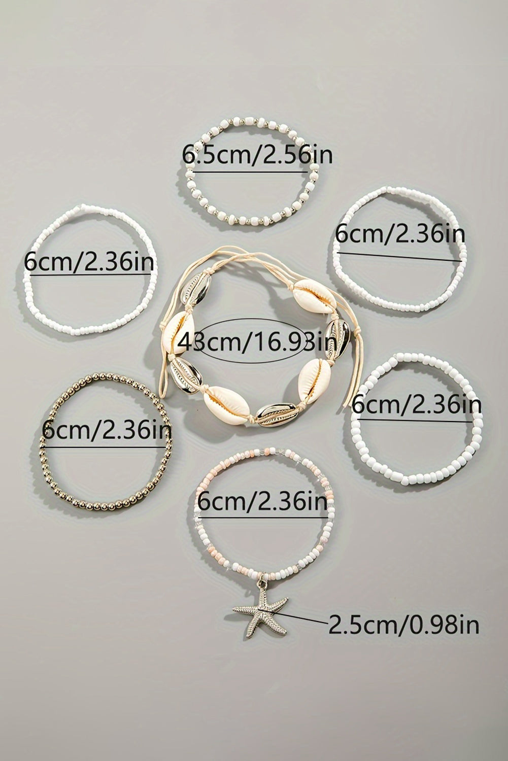 Lot de 7 bracelets en perles avec étoile de mer et coquillage, de couleur blanche