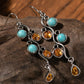 Boucles d'oreilles pendantes en alliage argenté avec turquoise et strass