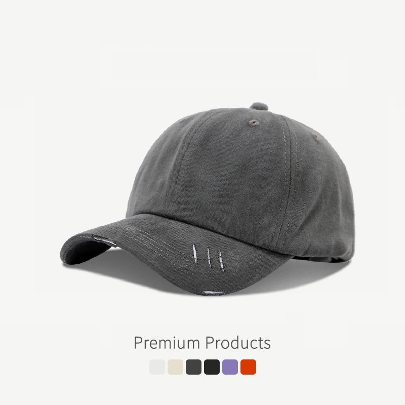Casquette de baseball à visière incurvée et déchirée