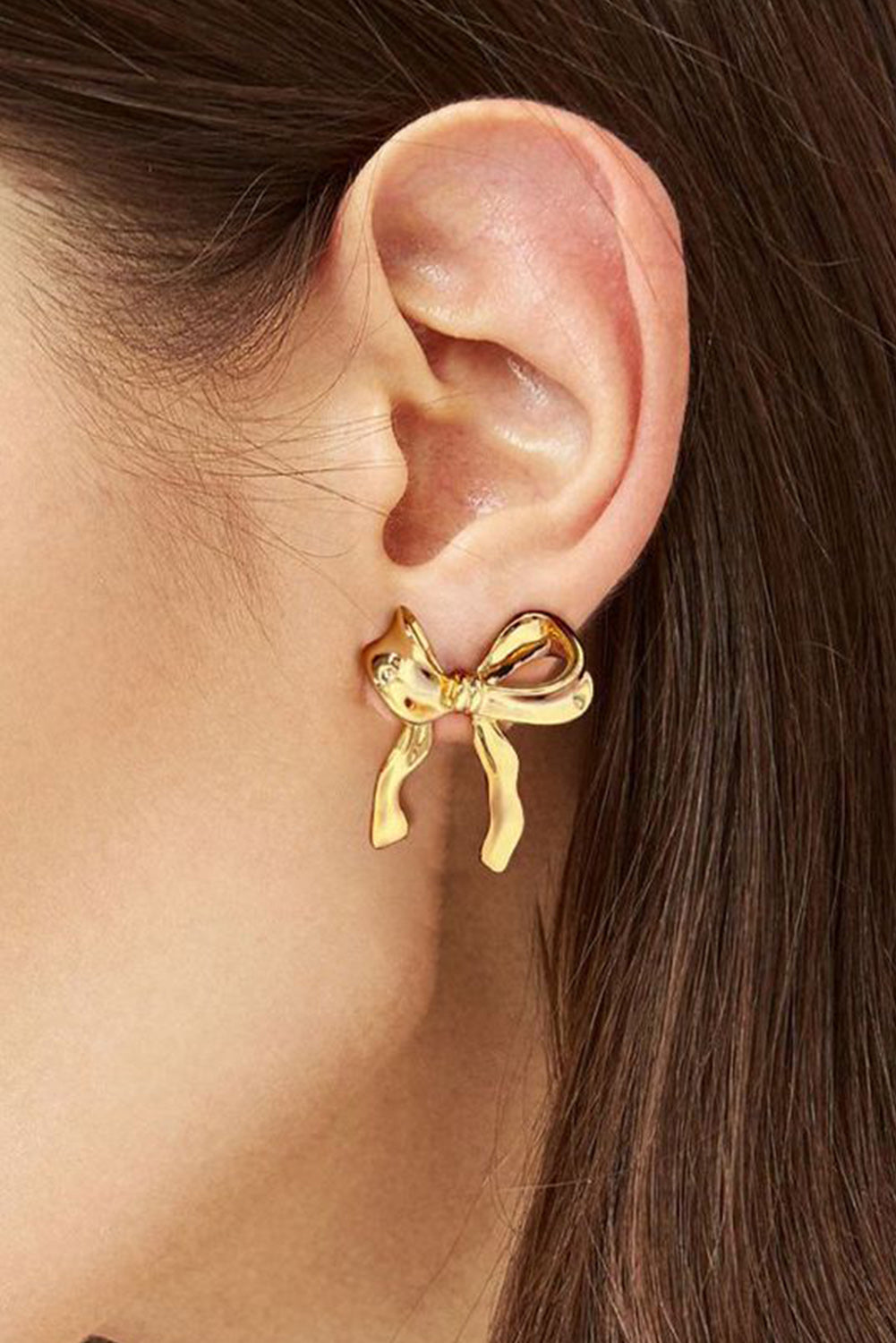 Boucles d'oreilles en forme de noeud avec ruban élégant en or