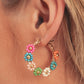 Boucles d'oreilles goutte d'eau en perles de fleurs roses contrastées de forme ronde